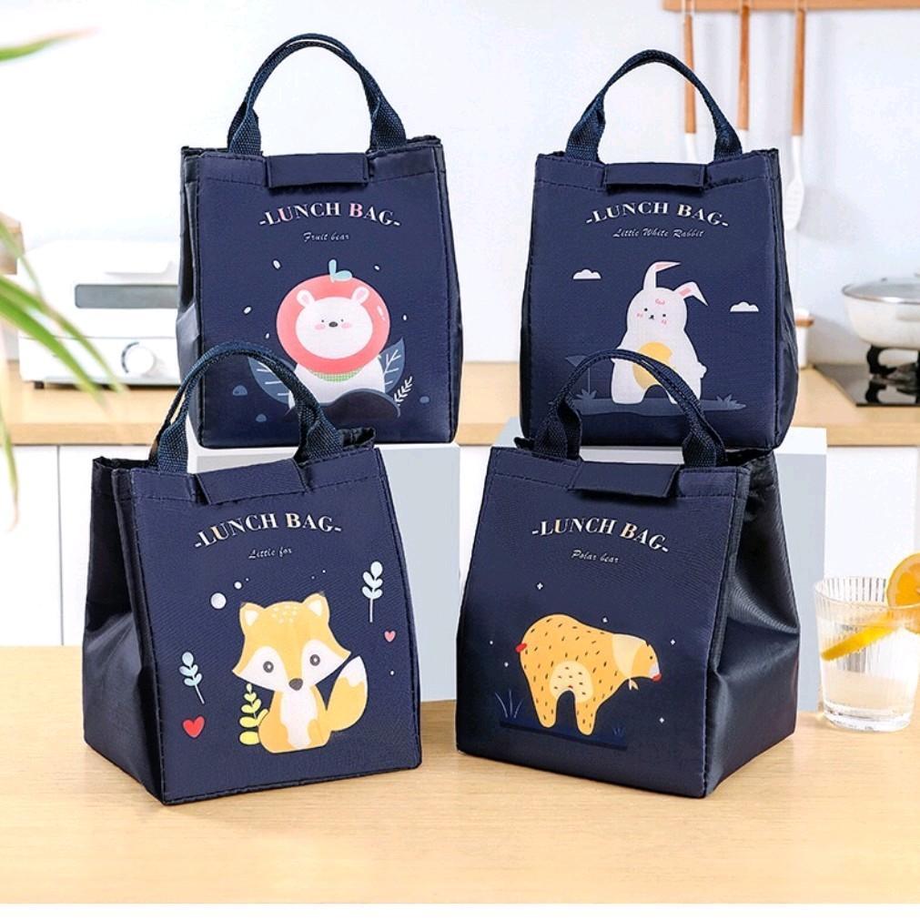 กระเป๋า​เก็บ​อุณหภูมิ​ทรงสูง เปิดปิดด้วยตีนตุ๊กแก​ สีพื้นสกรีนลายการ์ตูน