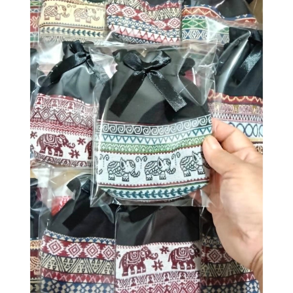 ของชำร่วยงานศพ ของที่ระลึกงานฌาปนกิจ ถุงผ้าทำจากผ้าทอพื้นเมืองพร้อมโบว์ พร้อมป้าย