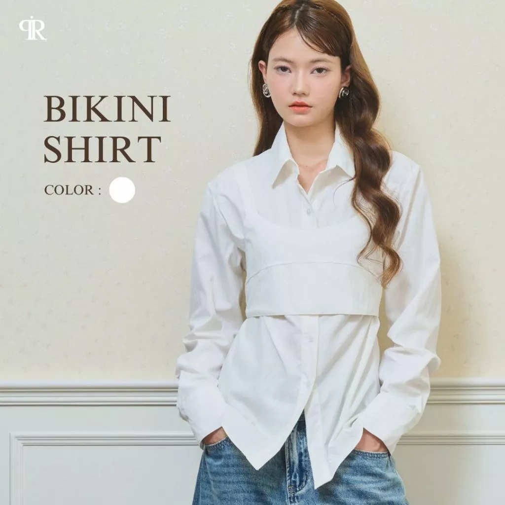 Panchitar Bikini Shirt – เสื้อเชิ้ตแขนยาวสีขาว เพิ่มดีเทลความไม่ธรรมดาด้วยเลเยอร์ทรงบิกินี่เย็บซ้อนอีกชั้นที่ช่วงอก
