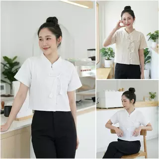เสื้อผ้าฝ้ายด๊อบบี้ ผูกโบว์ดอกทิวลิป เนื้อนุ่มใส่สบาย ตัวผ้าทอลายนูนมีเอกลักษณ์