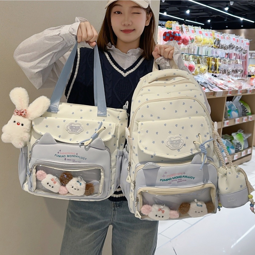 กระเป๋าเป้สไตล์ญี่ปุ่น สีโทนอ่อน เหมาะทุกวัย แถมฟรี กระเป๋าใส่เหรียญ + พวงกุญแจตุ๊กตานุ่ม🎀
