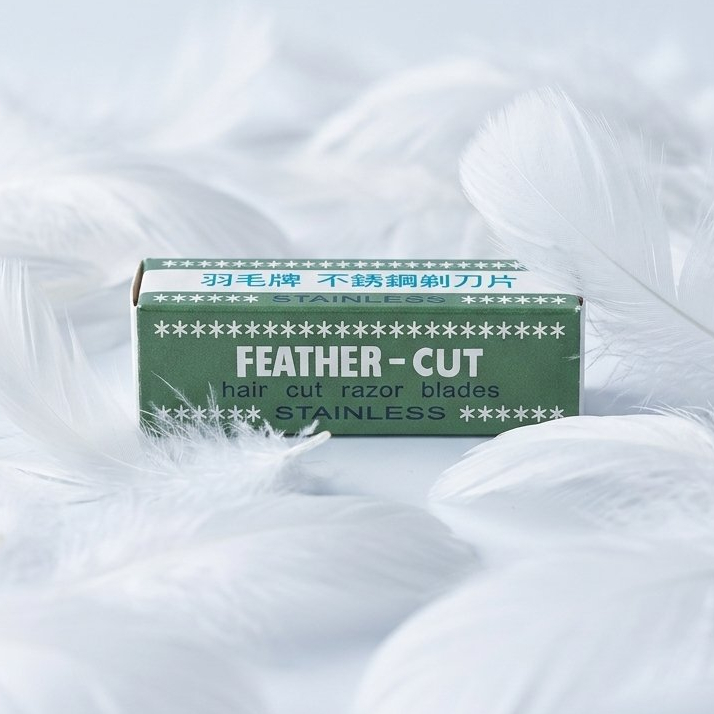 ใบมีดโกนตราขนนก  Feather  มีดกันคิ้ว กันไรผม ( 1 กล่อง = 12 ใบมีด)