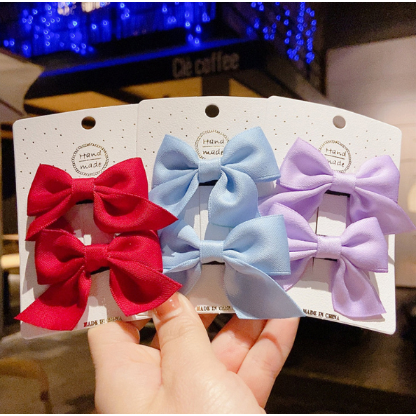 กิ๊บติดผม ประดับโบว์น่ารัก สีพื้น สไตล์เกาหลี สําหรับเด็กผู้หญิง จํานวน 2 ชิ้น