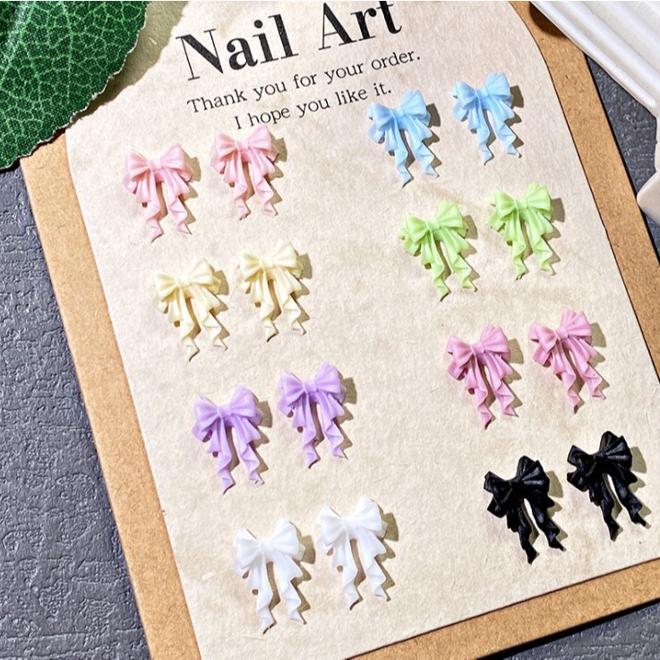 [ถุงละ 20 ชิ้น] 🎀✨โบว์สำหรับตกแต่งเล็บ โบว์เรซิ่น โบว์ติดเล็บ🎀🎀🎀💅 ตกแต่งเล็บให้สวยงามค่ะ 💅พร้อมส่งนะคะ [ร้านไทย]