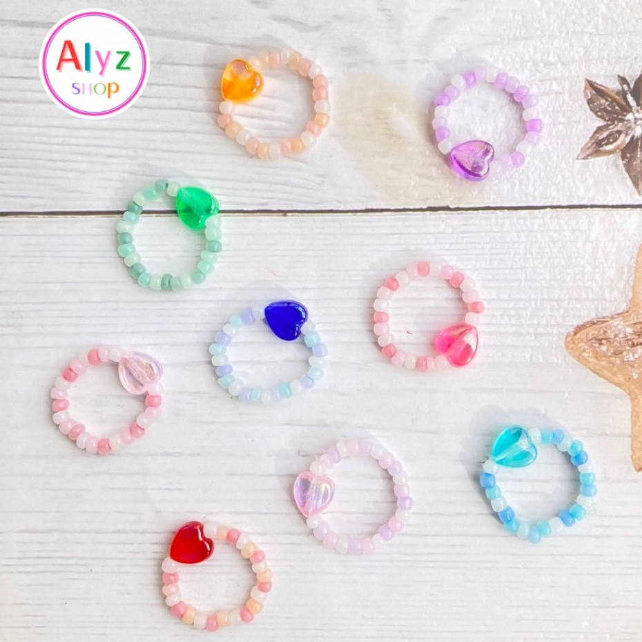 Alyz 🌈แหวนลูกปัด สไตล์สวยหวาน เลือกสีได้ สีรุ้งสีพาสเทล แหวนลูกปัดรัดรองเท้านักเรียน ของขวัญปัจฉิม