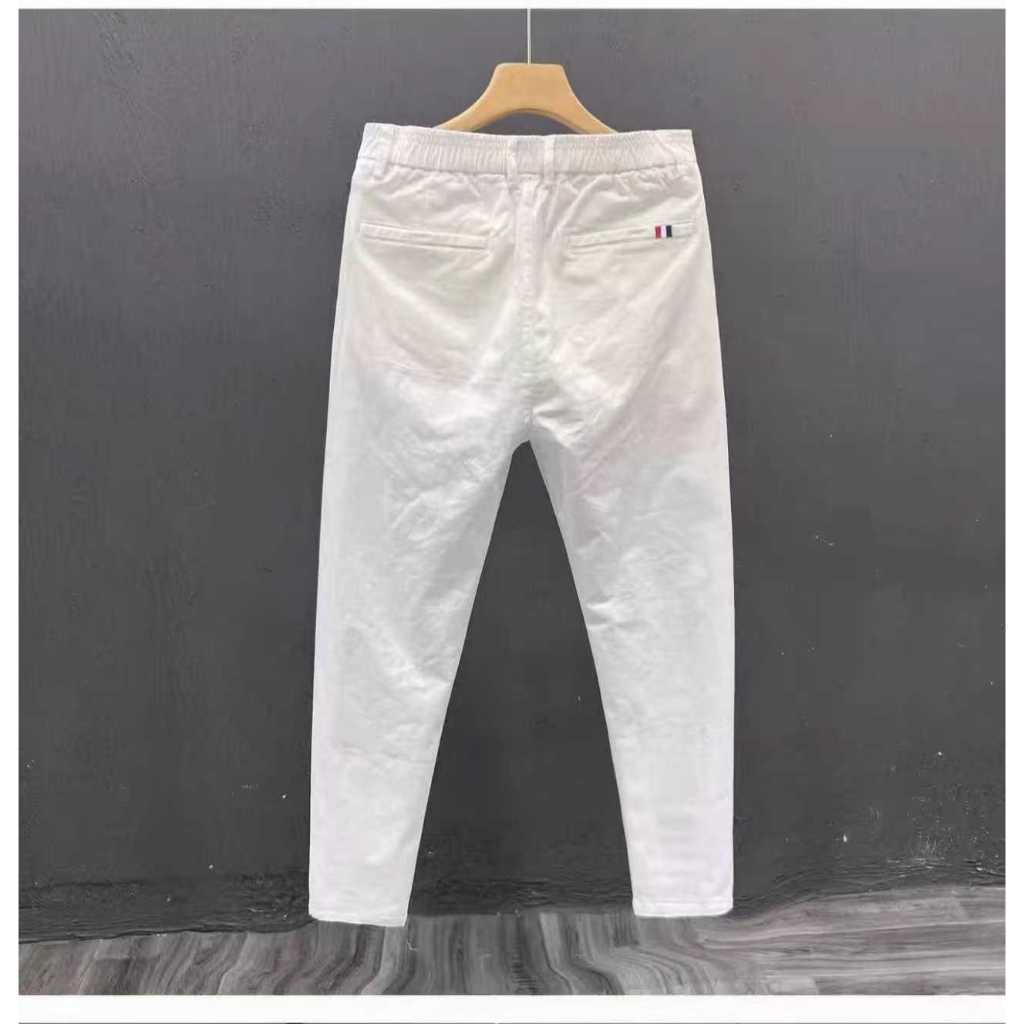 กางเกงขายาวชิโน่ ผ้ายืด ทรงกระบอกเล็ก (Slim-fit) by Normal Boy