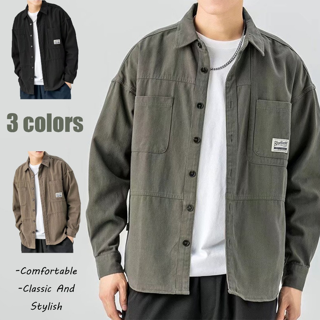 เสื้อเชิ้ตแขนยาวสีพื้นสไตล์เกาหลีสำหรับผู้ชาย มีกระเป๋า ทรงหลวมๆ อินเทรนด์ [มีสินค้าในสต๊อก]