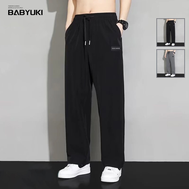 BU กางเกงกีฬากางเกงขายาวลำลองฤดูร้อน งานปักป้ายหนัง ทรงหลวมใส่สบายเอวยางยืดเนื้อผ้าระบายอากาสได้ดี