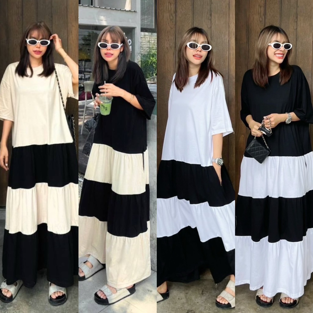 เดรสคอกลมแขนสั้น ทรง oversize ดีเทลต่อระบายเป็นชั้นๆ รอบนี้เพิ่มความเกร๊ด้วยสีทูโทน ขาว-ดำ