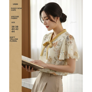เสื้อ Unim เสื้อโบว์ผูกผูกแขนระบาย ลายดอกไม้เหลือง