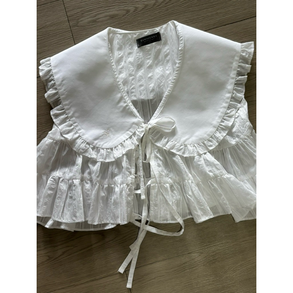 เสื้อแขนกุดสีขาวผูกโบว์ด้านได้แบร์นsummerry.official