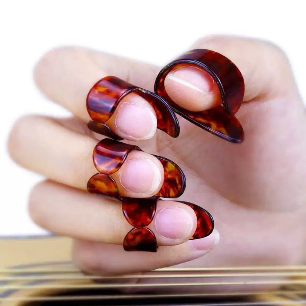 ชุดปิ๊กกีต้าร์นิ้วThumb Pick Finger Guitar Pick Set 4ชิ้น Celluloid1 Thumb+3Finger Guitar มีให้เลือกหลายสีในราคาเบาๆ