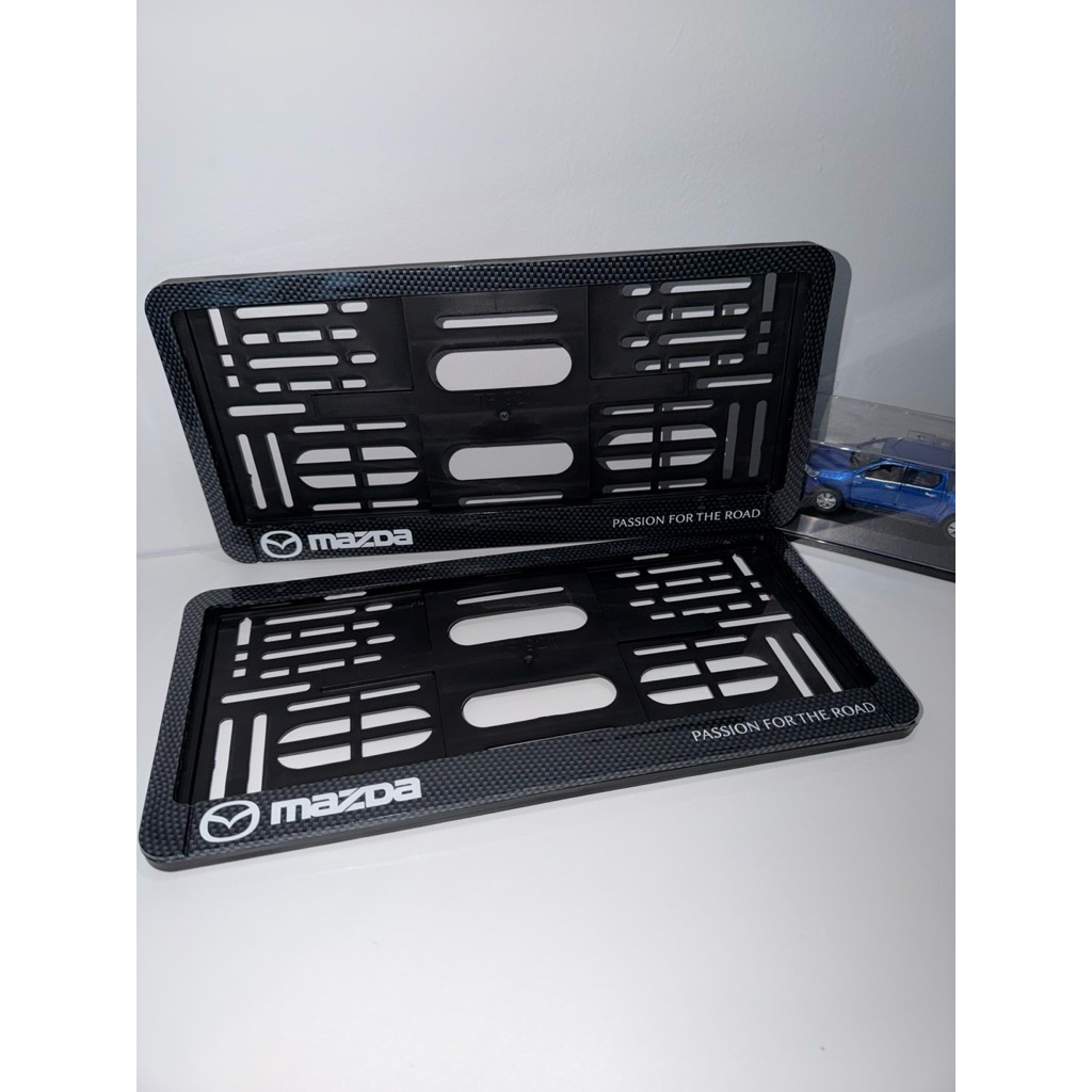 MAZDA กรอบป้ายทะเบียนรถยนต์ สกรีนลายเคฟล่า