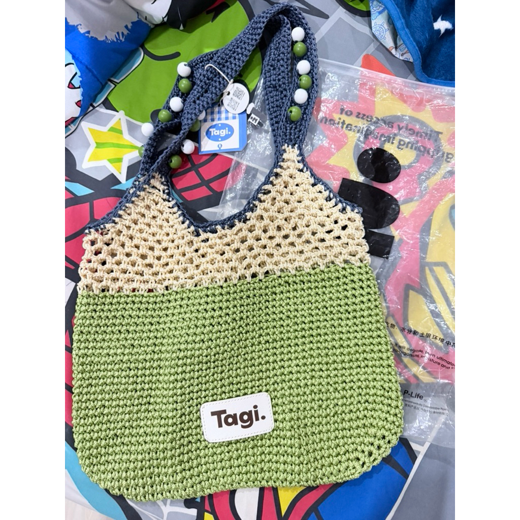 กระเป๋าสะพายข้างTagi