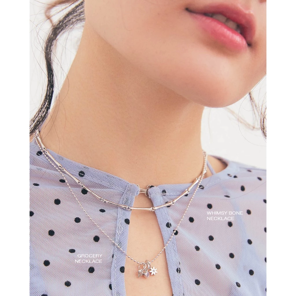 Julys - whimsy bone necklace