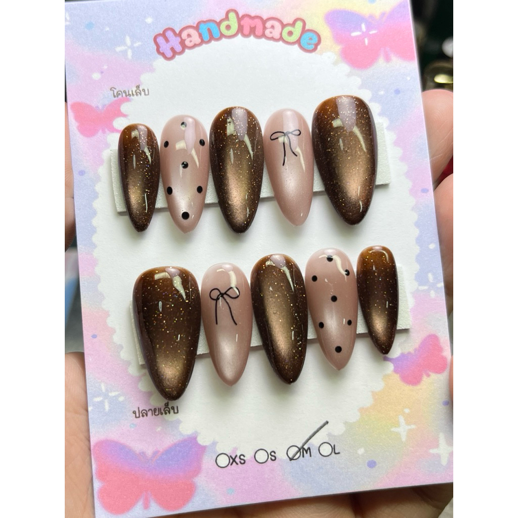 เล็บเจลสีลูกแก้วน้ำตาลติดโบว์รองาน1-2วันมีทุกไซส์เปลี่ยนทรงได้