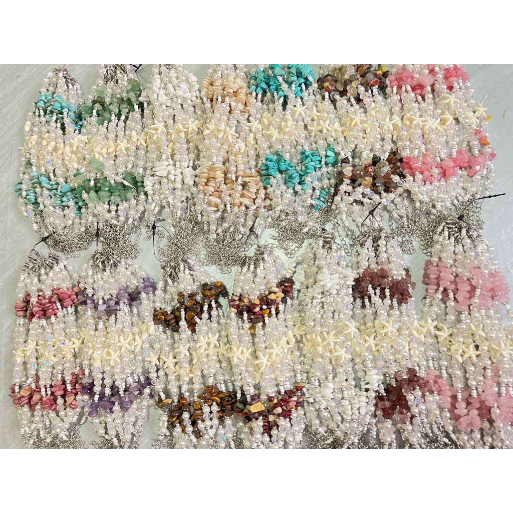 ข้อมือลูกปัดมุกจี้ปลาดาวราคา1โหล12ชิ้น⭐️🐚🪸
