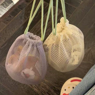 กระเป๋าตาข่ายเก็บของ พับได้ น้ำหนักเบา มีเชือกรูด ปิดเปิดง่าย จัดระเบียบของใช้ในบ้านและเวลาเดินทาง