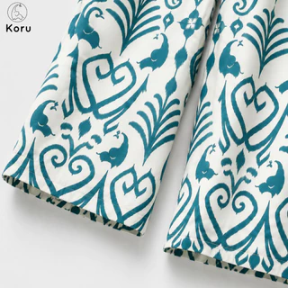 KORU กางเกงขายาวทรงหลวม ลายช้างพิกเซล