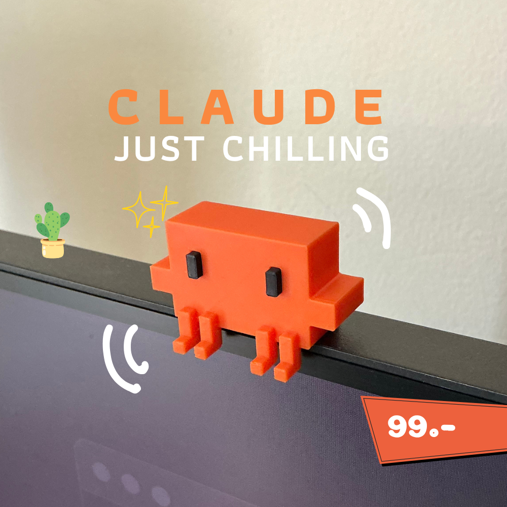 น้อง Claude นั่งหน้าคอม วางบนขอบจอคอมพิวเตอร์น่ารักๆ
