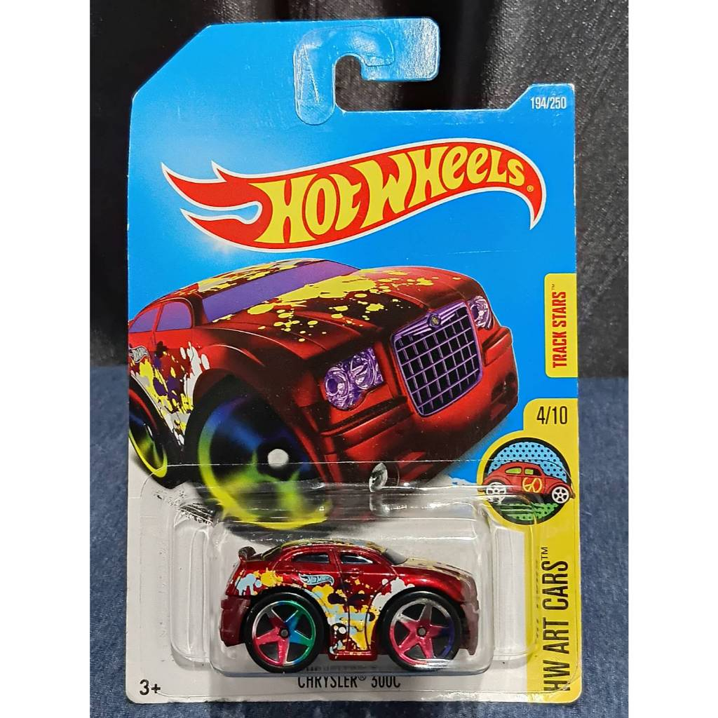 โมเดลรถ Hot Wheels Chrysler 300C Blings Red HW ART CARS 4/10 New IN Packed.