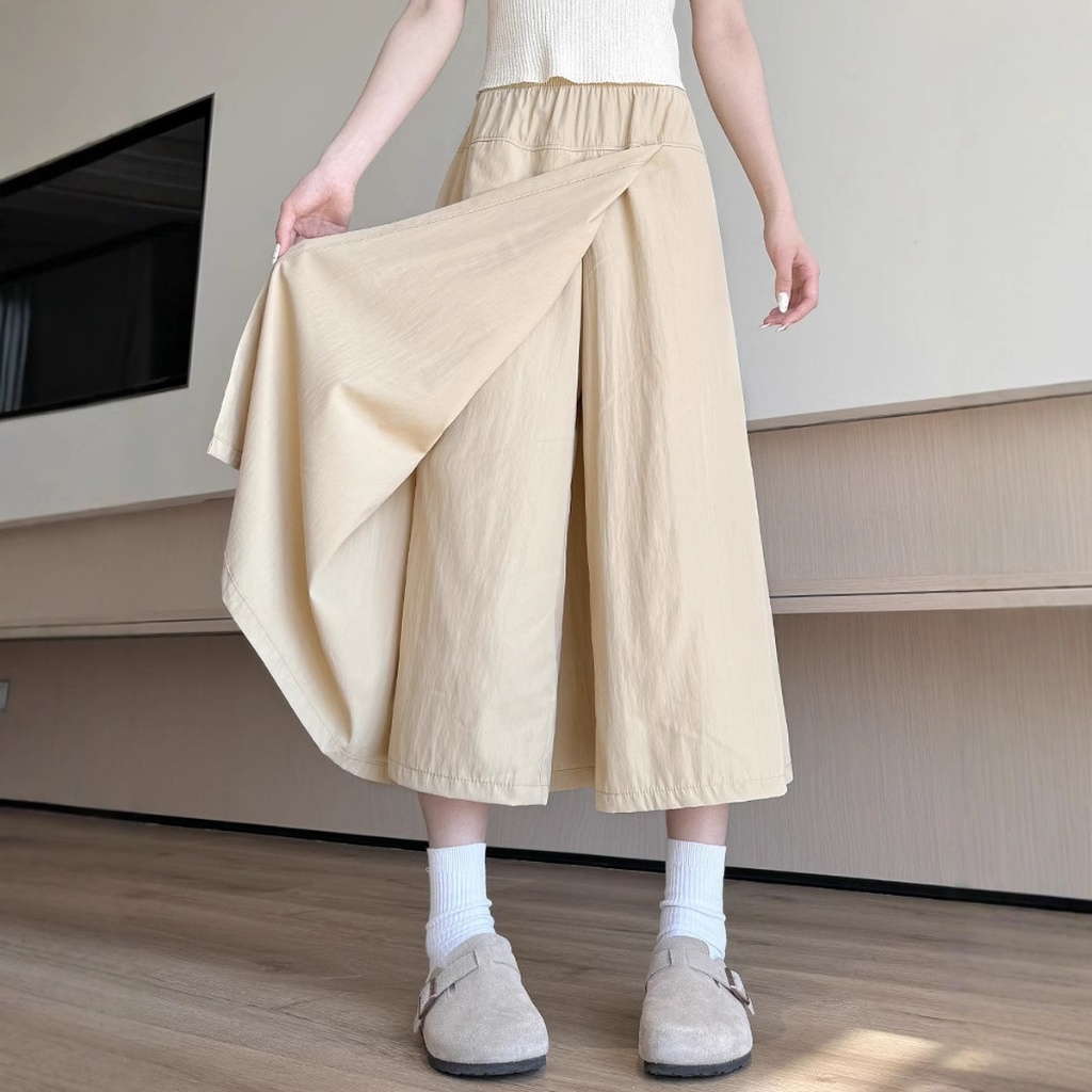 กางเกงกระโปรงขาบานฤดูร้อนของผู้หญิงเกาหลี เอวยางยืด สบายๆ ผ้าคุณภาพดี กางเกงเก้าส่วน เอวปรับได้ กางเกง