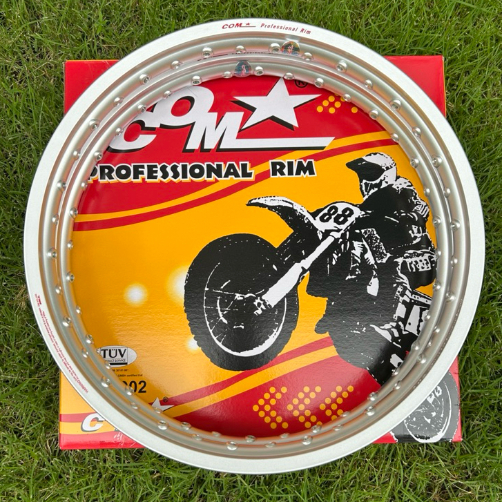 ล้อขอบเรียบ 1.40x17 สีเงิน คอมดาวแท้ Professional กล่องเหลือง (1คู่)