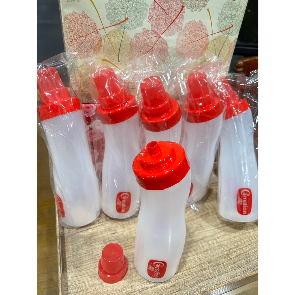 (ขายส่งยกลัง 24ใบ) ขวดบีบซอสคาร์เนชั่น 750ml ml รุ่นมีฝาครอบจุก