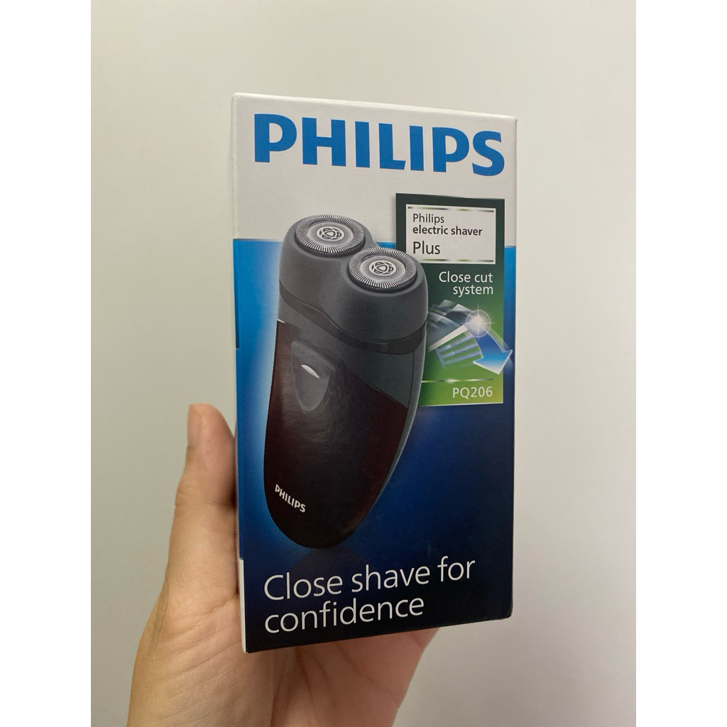 Philips ฟิลิปส์ เครื่องโกนหนวดไฟฟ้า พกพา ใช้ได้ทั่วโลก รุ่น PQ206/18