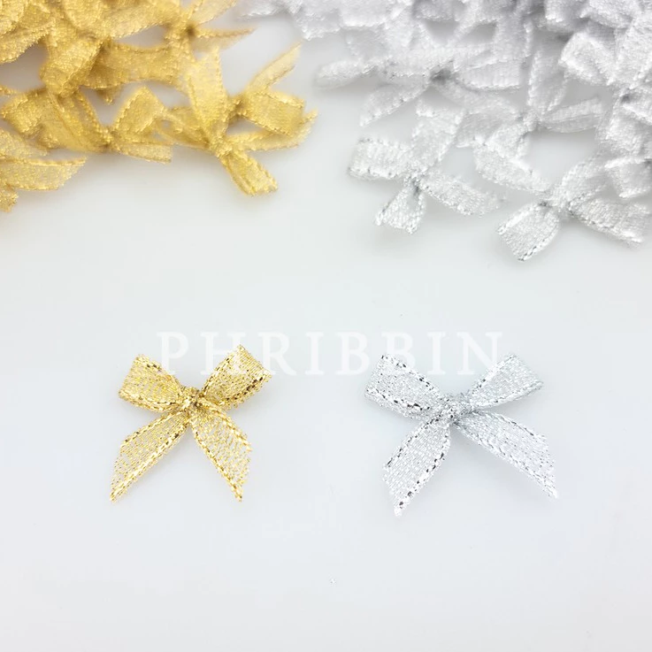มินิโบว์ 7มิล ถุงละ100ชิ้น ริบบิ้นทรายสีเงิน-สีทอง
