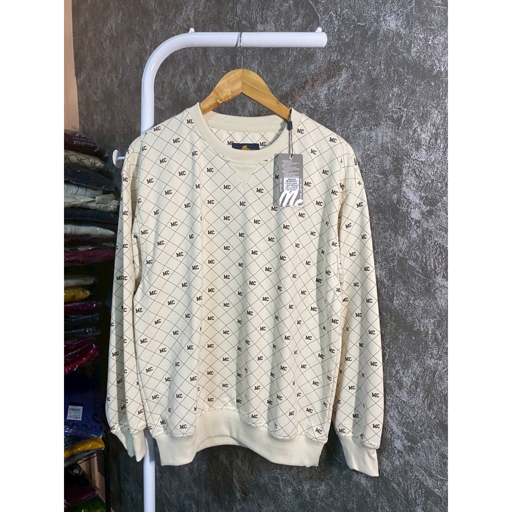 MC สเวตเตอร์ ลายโมโนแกรม (สีครีม)
