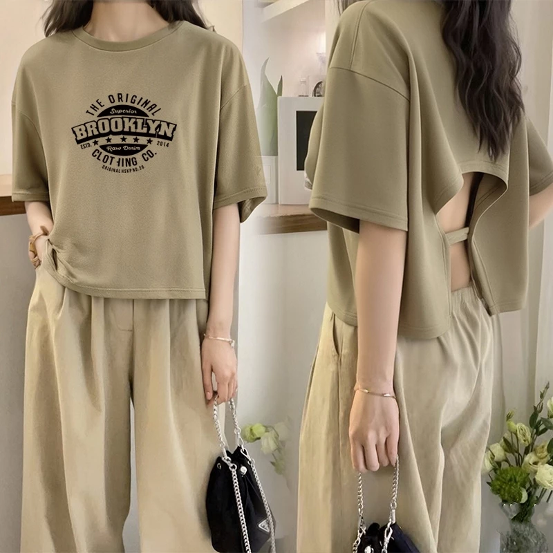 เสื้อครอปสาวอวบน่ารัก oversize เสื้อผ้าแฟชั่นไซส์ใหญ่ เสื้อยืดหญิงแขนสั้นแบบหลวมสไตล์เกาหลี สกรีนวินเทจ เซ็กซี่ เปิดหลัง