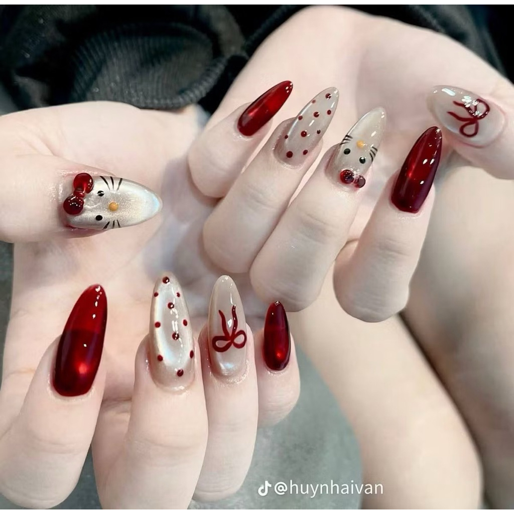 77[Toeyty]เล็บเจล สีลูกแก้วเพ้นลายคิตตี้ ติดโบว์แดง