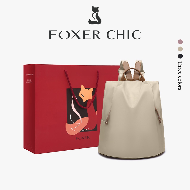 FOXER กระเป๋าเป้สะพายหลังผู้หญิง วัสดุผ้าใบ กระเป๋าเป้นักเรียน ความจุขนาดใหญ่ 10-14 นิ้ว