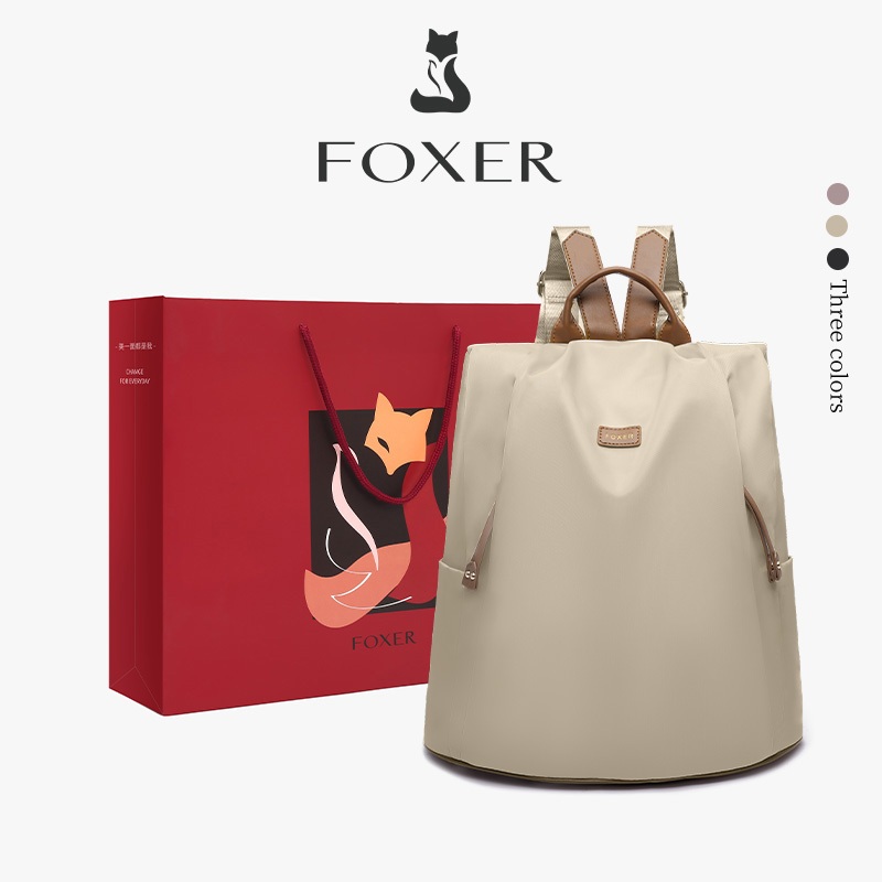 FOXER กระเป๋าเป้สะพายหลังผู้หญิง วัสดุผ้าใบ กระเป๋าเป้นักเรียน ความจุขนาดใหญ่ 10-14 นิ้ว