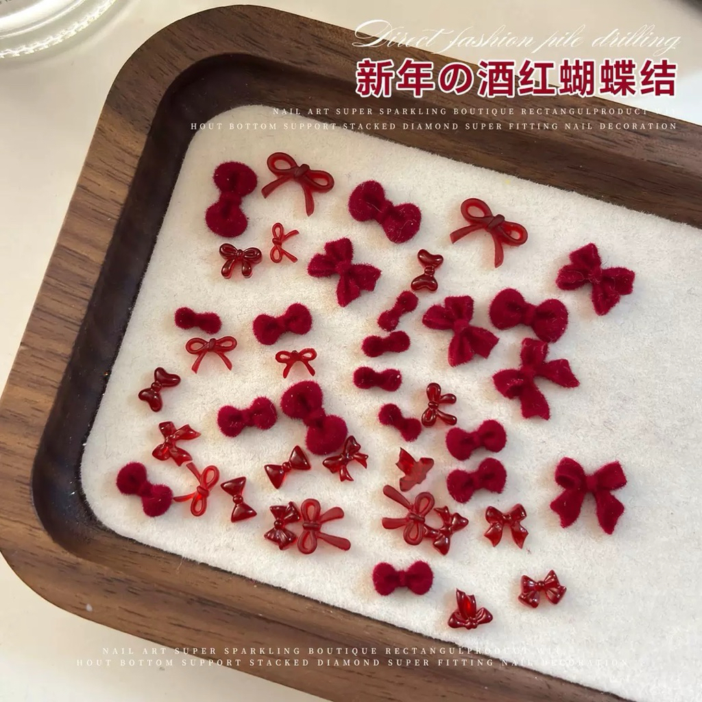 อะไหล่โบว์สวยๆ สีแดง นำมาตกแต่งเล็บ ติดของอเนกประสงค์ 50 ชิ้น/แพ็ค สินค้าพร้อมส่ง