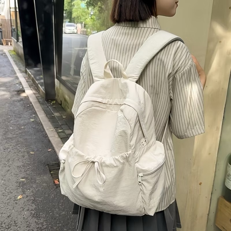 กระเป๋าเป้สไตล์เกาหลีดีไซน์เรียบง่ายเดินทางใส่ได้หลายสไตล์น้ำหนักเบาสีพื้นจุเยอะกระเป๋านักเรียน