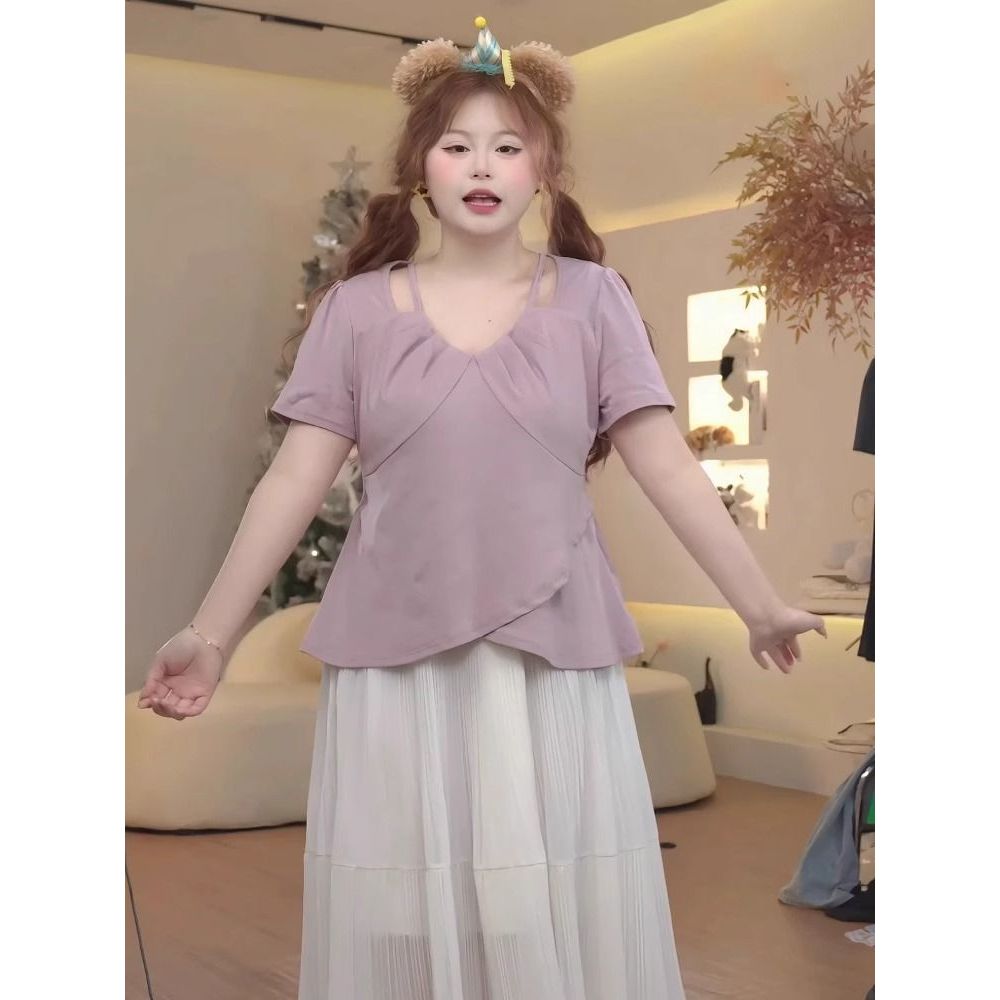 สาวอ้วนขนาดใหญ่แฟชั่นและสไตล์แขนสั้นผิดปกติด้านบน