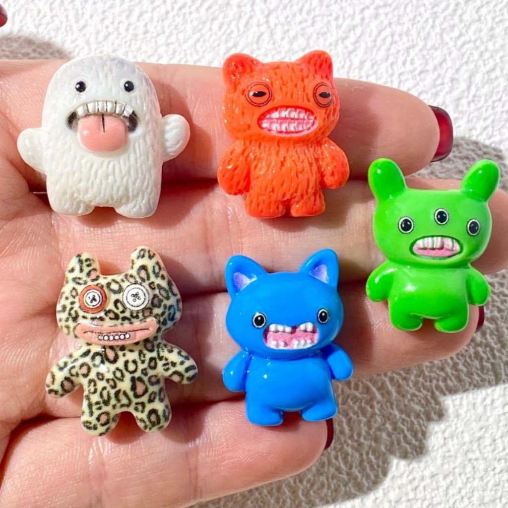 j100/1การ์ตูนมอนสเตอร์ของจิ๋วดีไอวายแพ็คละ 10 ชิ้น