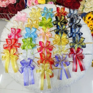 โบว์จากริบบิ้นผ้าคาดริบบิ้นทรายมีพร้อมส่งจ้า