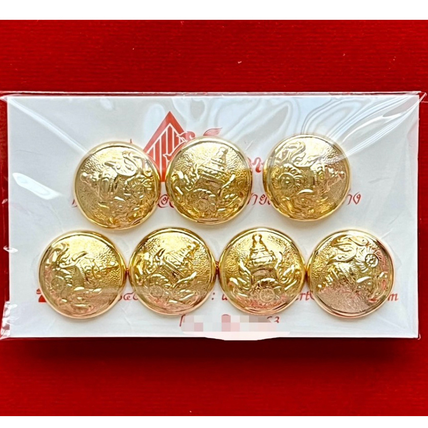 เครื่องหมาย กระดุม 7 เม็ด จากร้านอัศวอาสน์