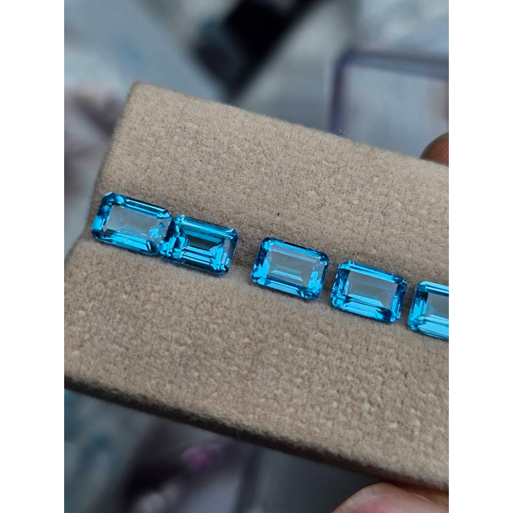 สี่เหลี่ยมผืนผ้าตัดมุม 7x5มิล 1เม็ด‘ พลอยแท้ สวิสบลูโทพาส Natural Swiss Blue Topaz พลอย บลูโทพาส โทพาส โทปาส พลอยสีฟ้า