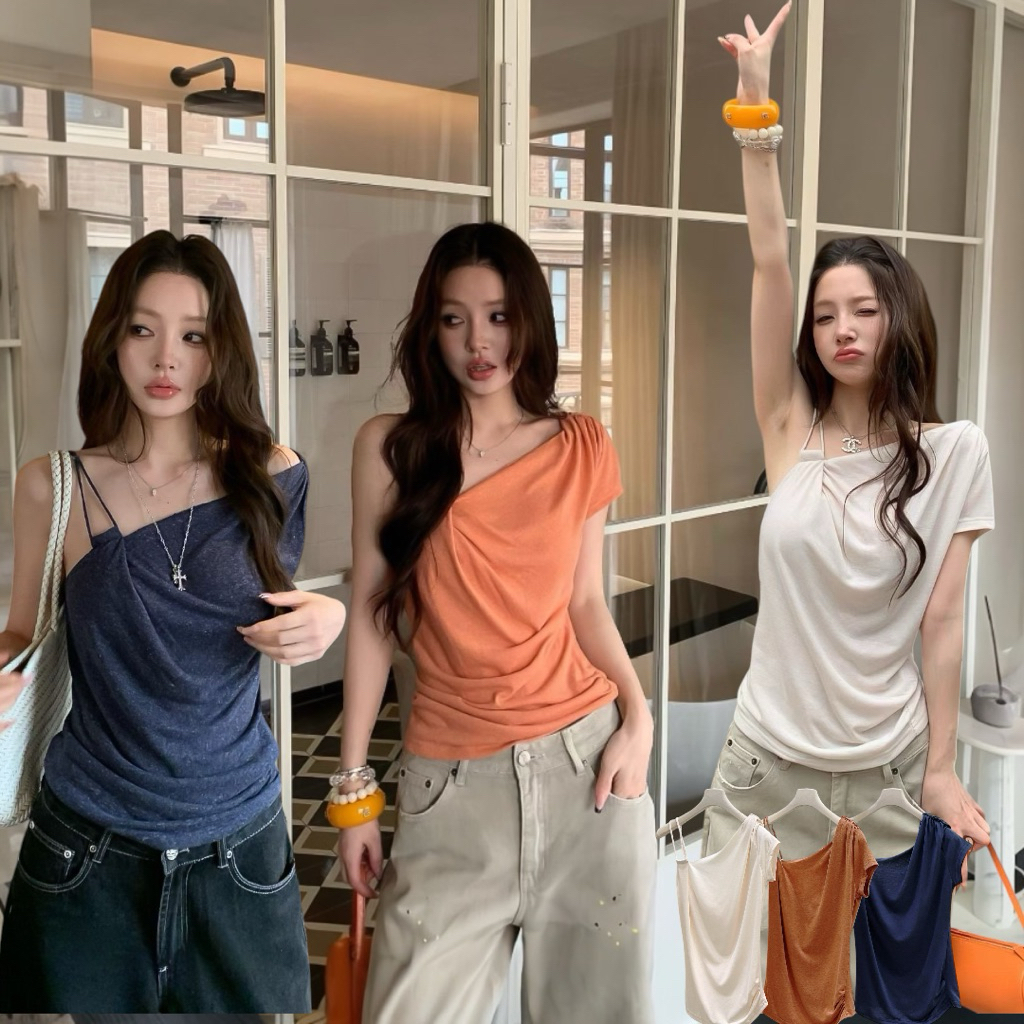 ส่งด่วน 🛵 𝗘𝗟𝗟𝗘 𝗗𝗥𝗔𝗣𝗘 𝗧𝗢𝗣 เสื้อดีไซน์เก๋ที่ช่วยให้ลุคแบบสาวชิค ทรงไหล่เบี่ยง