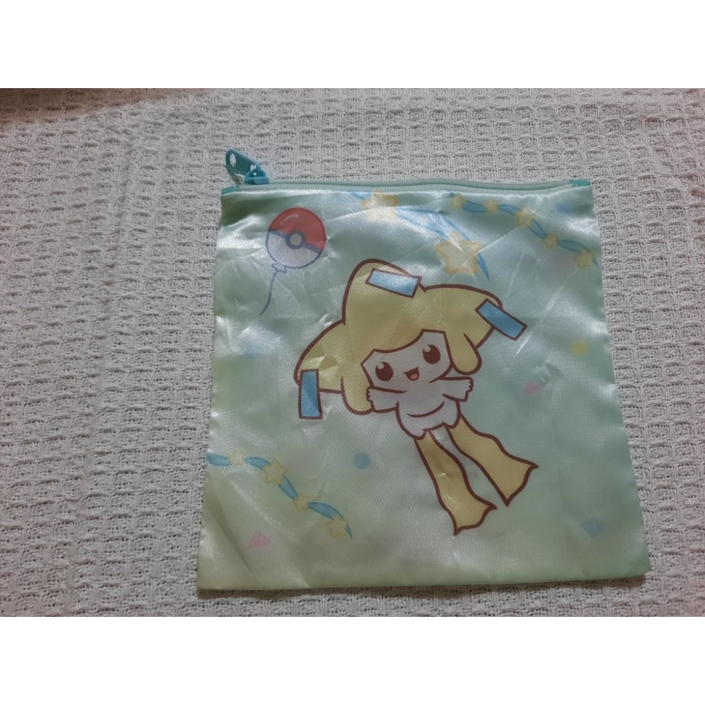 (มือสอง)กระเป๋าผ้าลื่นบาง  Pokemon PokePeace ☆ Jirachi ☆ขนาด 15 cm.