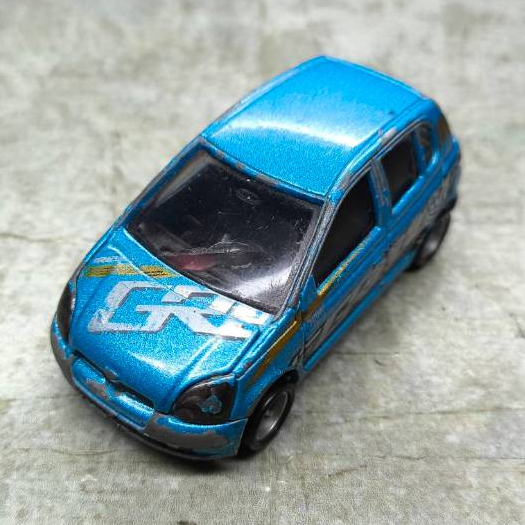 โมเดลรถเหล็ก Tomica รุ่น Toyota Vitz  GReddy / Trust  : Tokyo Auto Salon 2006 S=1/57