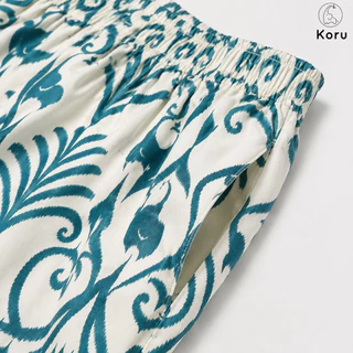 KORU กางเกงขายาวทรงหลวม ลายช้างพิกเซล