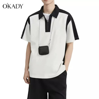 OKADY เสื้อโปโลผู้ชายสีตัดกันลำลองแขนสั้นใหม่เวอร์ชั่นเกาหลีหลวมซิปด้านบนปก