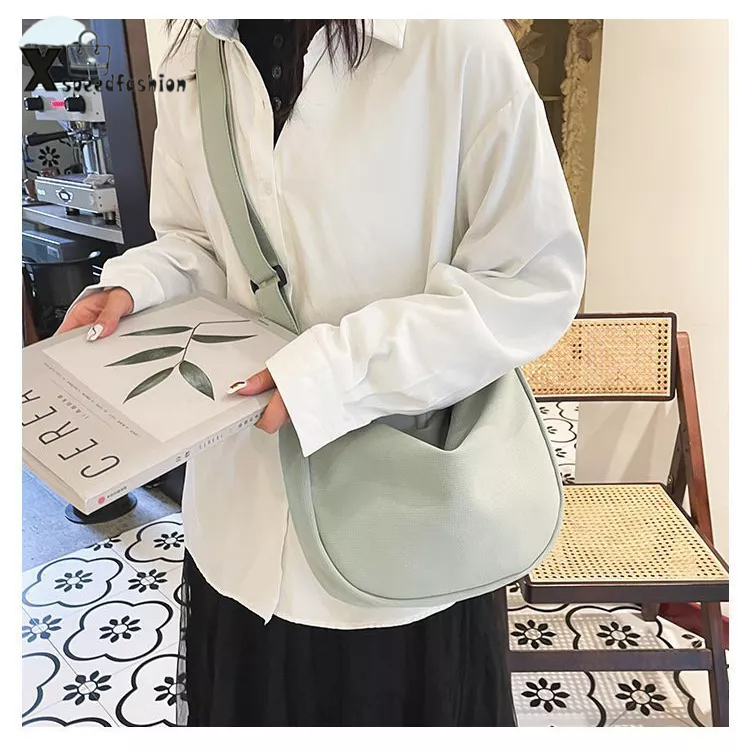 xspeedfashion(X1833) กระเป๋าสะพายข้างผ้าไนล่อนสีพื้นลายเส้น สไตล์เกาหลี(ไม่มีที่ห้อยแถม)