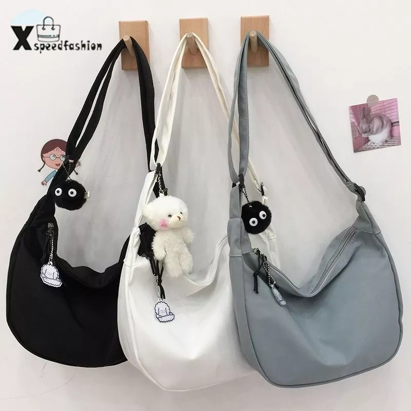 xspeedfashion(X1832) กระเป๋าสะพายข้าง สีพื้น ผ้าไนล่อน สไตล์เกาหลี(ไม่มีที่ห้อยแถม)
