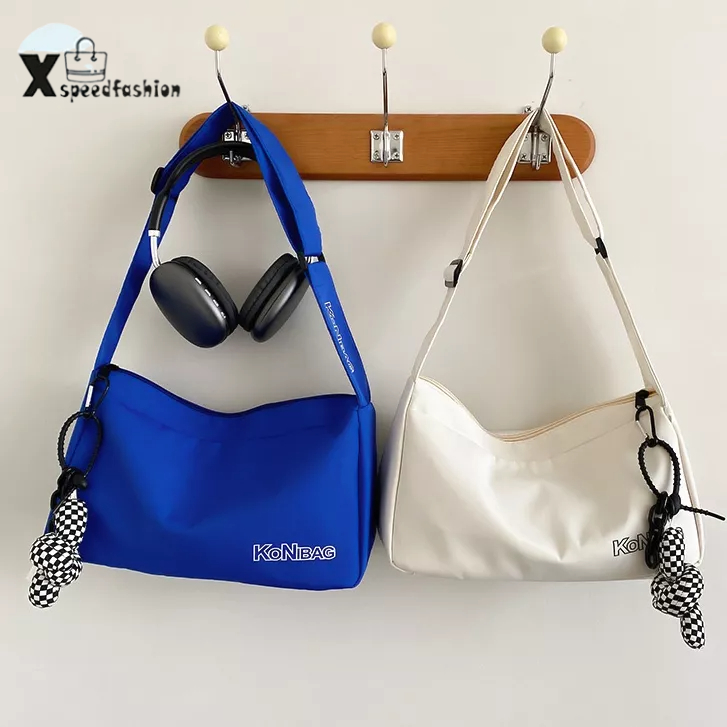 xspeedfashion(X1851) กระเป๋าสะพายข้างKoNBAG ผ้าอ๊อกซ์ฟอร์ด (แถมที่ห้อย)